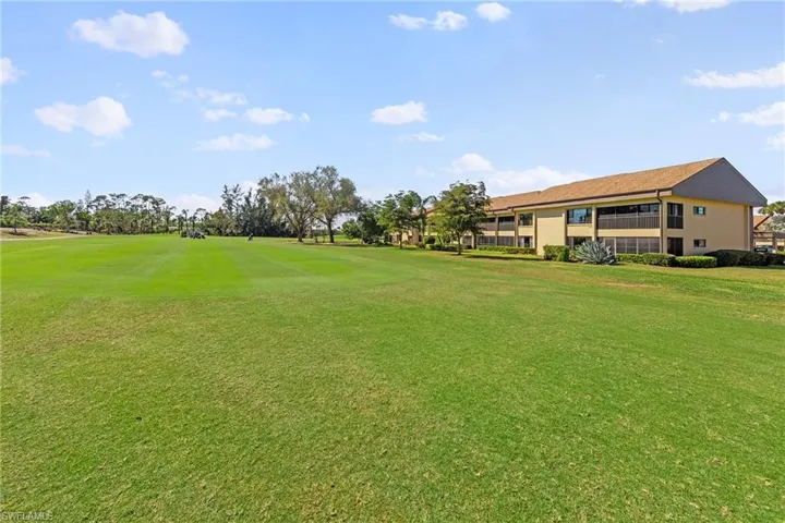 View of home's community featuring view of golf course