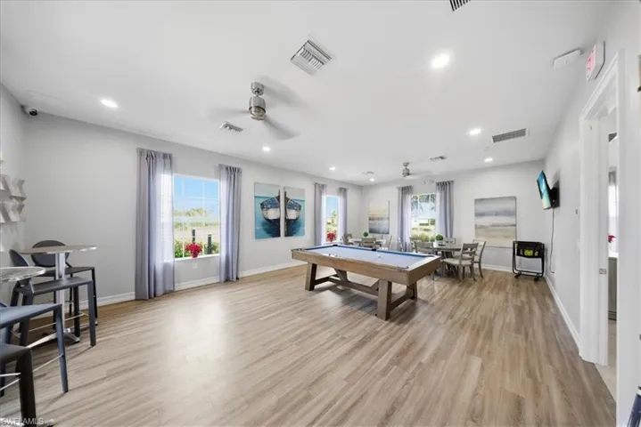 Recreation room featuring billiards, ceiling fan, and recessed lighting