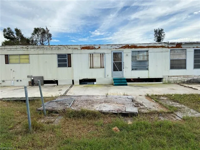 Rear view of house with a patio area