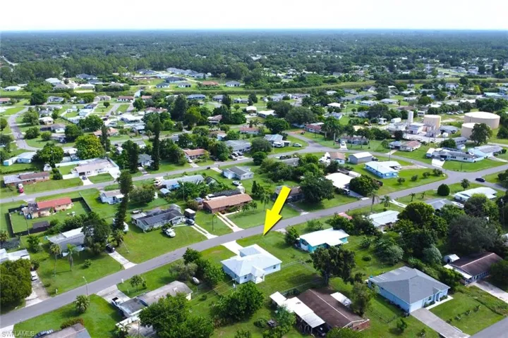 View of property location with nearby suburban area