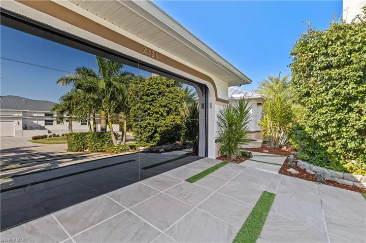 View of entrance/glass garage door