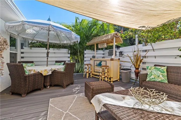 Composite terrace with outdoor dining area