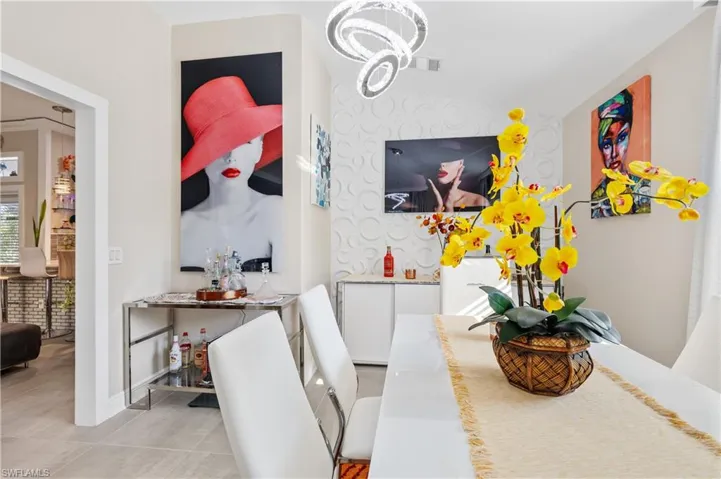 Dining room featuring an accent 3D wall