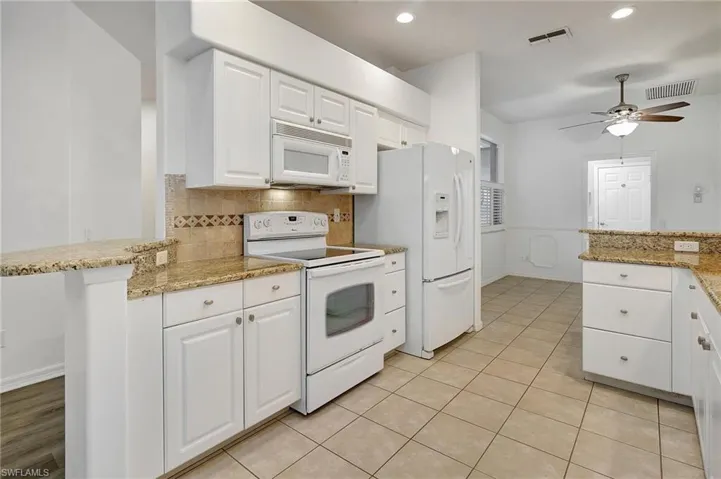 Kitchen (Without Dinette Set) Looking Towards French Door to the Laundry Room and Garage