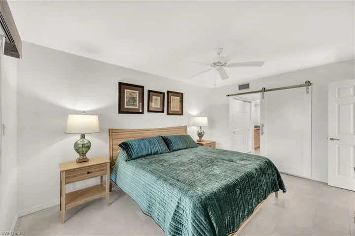 Primary Bedroom Showing Solid Barndoor Slider for Privacy