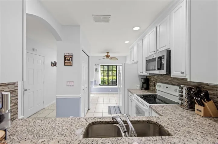 7715  Woodbrook  CIR, Naples, FL 34104