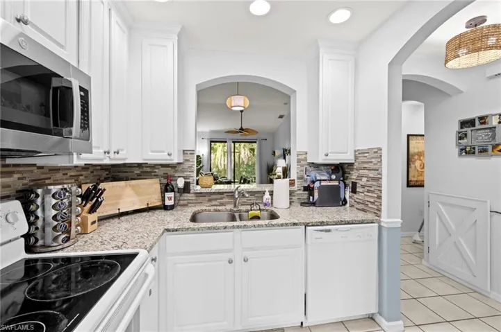 7715  Woodbrook  CIR, Naples, FL 34104