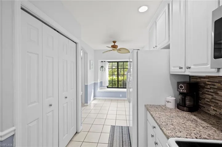 7715  Woodbrook  CIR, Naples, FL 34104