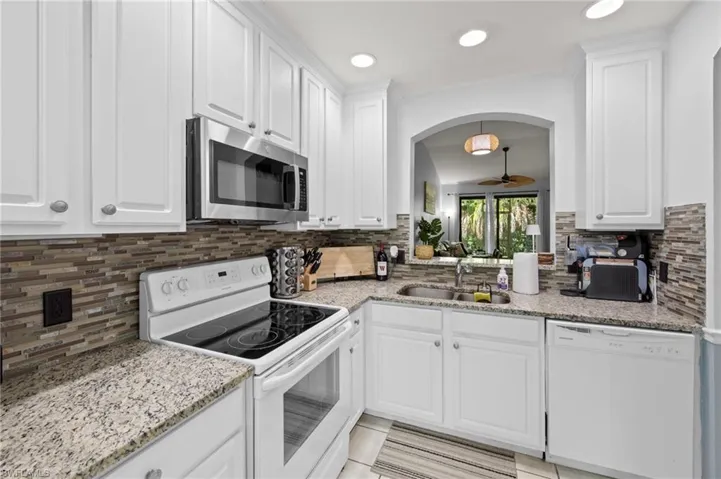 7715  Woodbrook  CIR, Naples, FL 34104