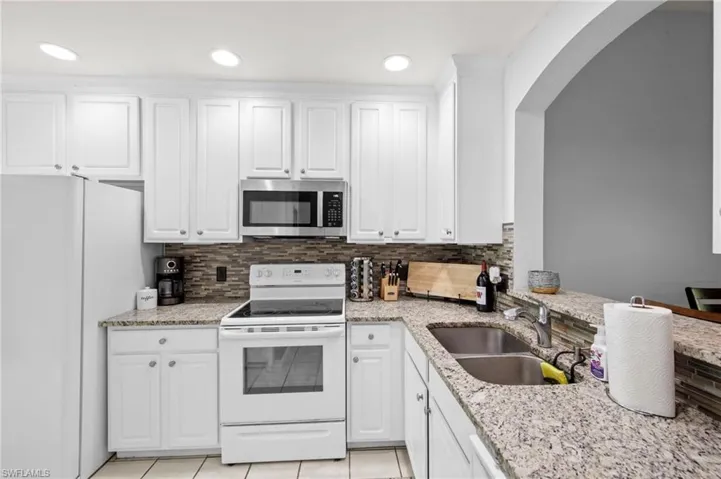 7715  Woodbrook  CIR, Naples, FL 34104