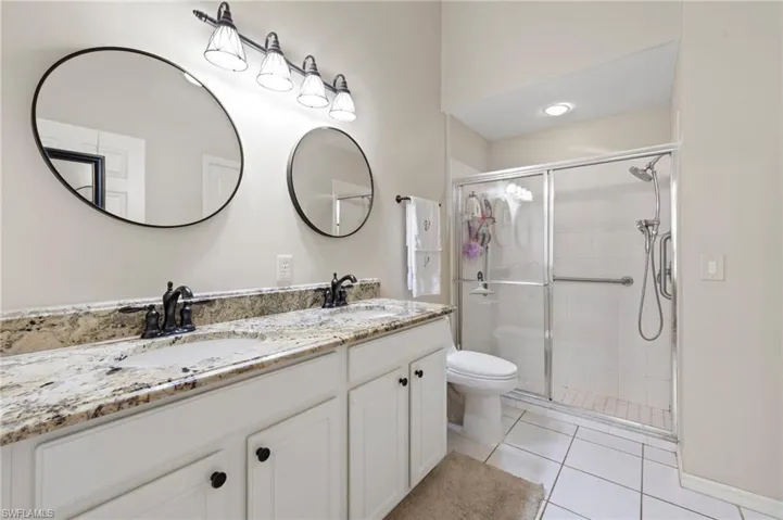 7715  Woodbrook  CIR, Naples, FL 34104