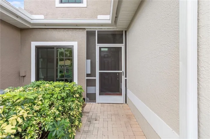 7715  Woodbrook  CIR, Naples, FL 34104