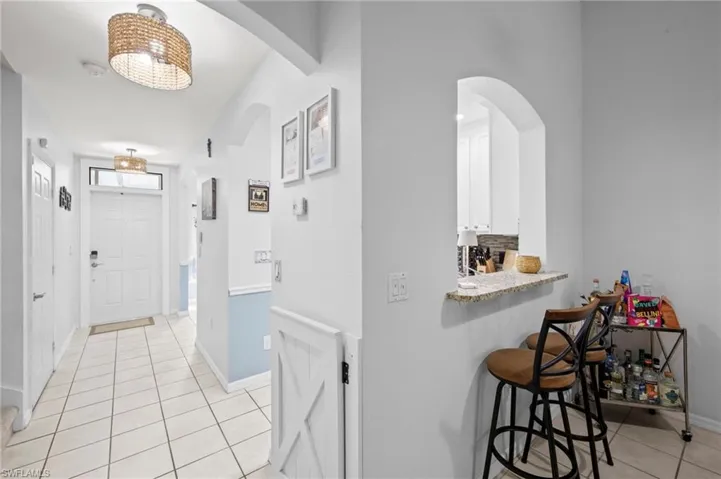 7715  Woodbrook  CIR, Naples, FL 34104