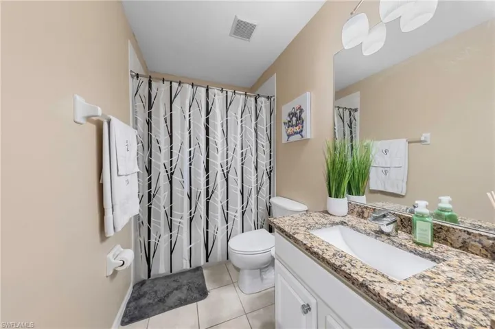 7715  Woodbrook  CIR, Naples, FL 34104