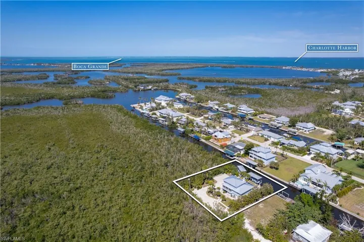 Aerial view with a residential view and a water view