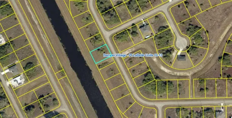 Aerial map of property and surrounding area featuring property boundaries highlighted