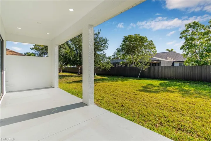 Fenced backyard featuring a patio area