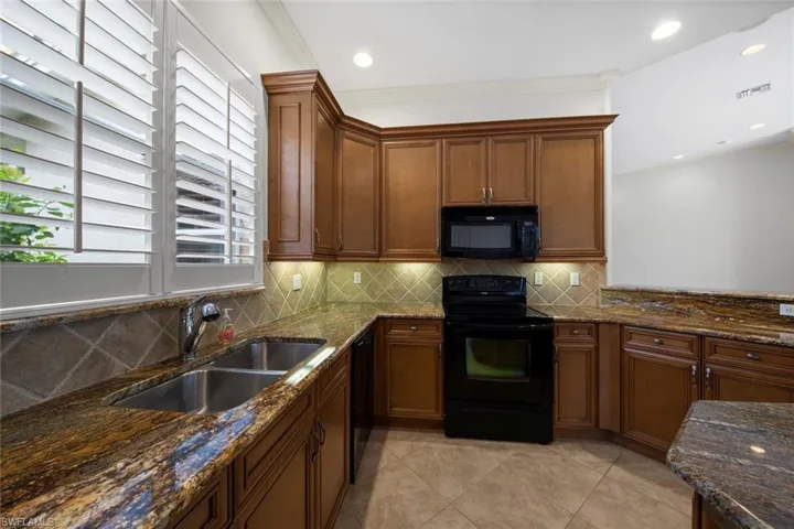 Granite counters, tile backsplash