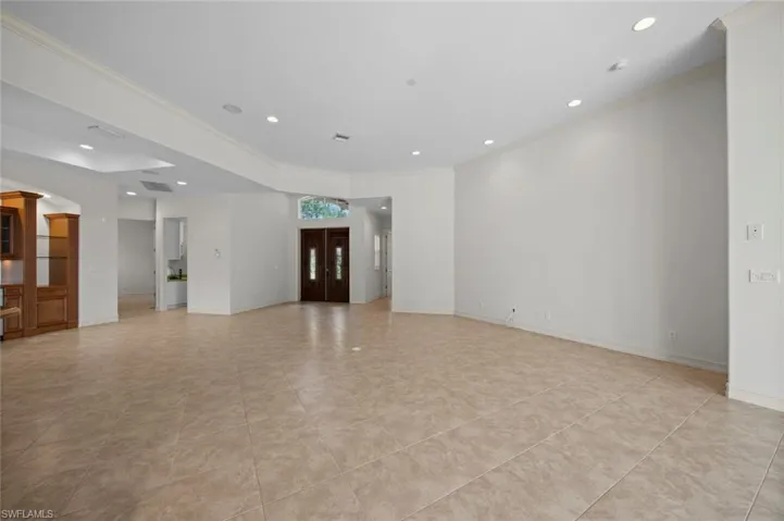 Great room looking back to front entry