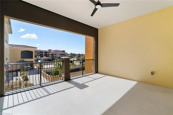 Balcony featuring ceiling fan