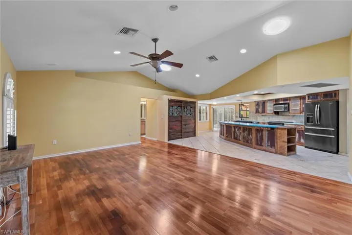 Family room and kitchen are open concept with a wealth of natural light