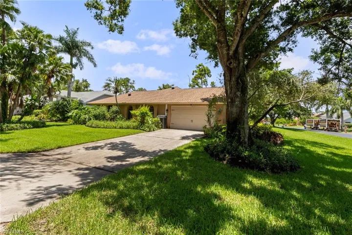 Lushly landscaped with large yard