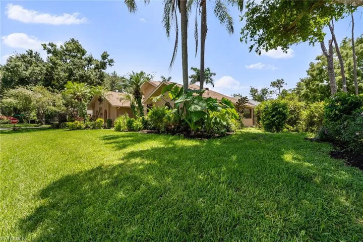 Lushly landscaped with large yard