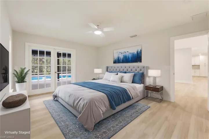 Virtually staged Bedroom with french doors, ceiling fan, light hardwood / wood-style floors, and access to outside
