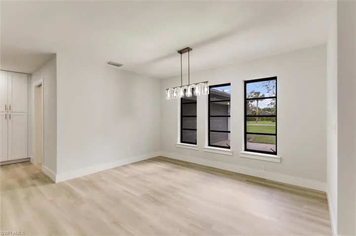 Unfurnished dining area with light hardwood / wood-style floors