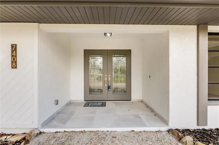 Entrance to property with french doors