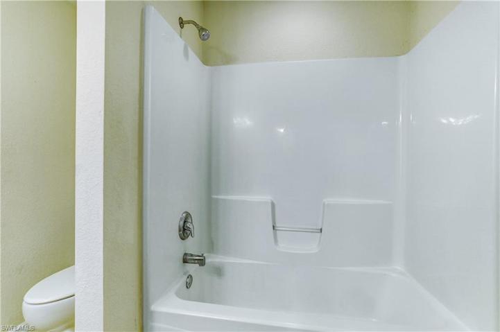 Upstairs guest bath with tub/shower combination.