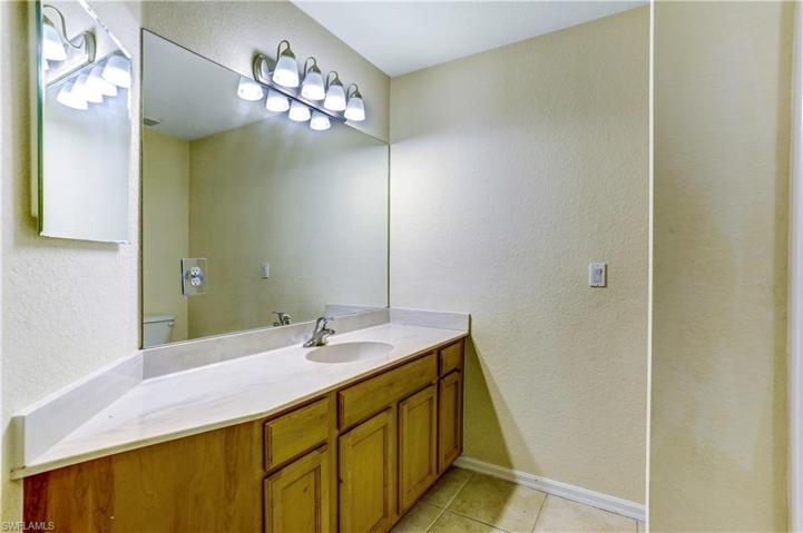 Upstairs guest bath with large vanity.