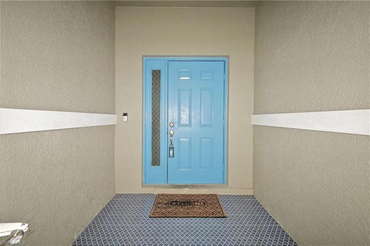 Custom tiled screened entry way.