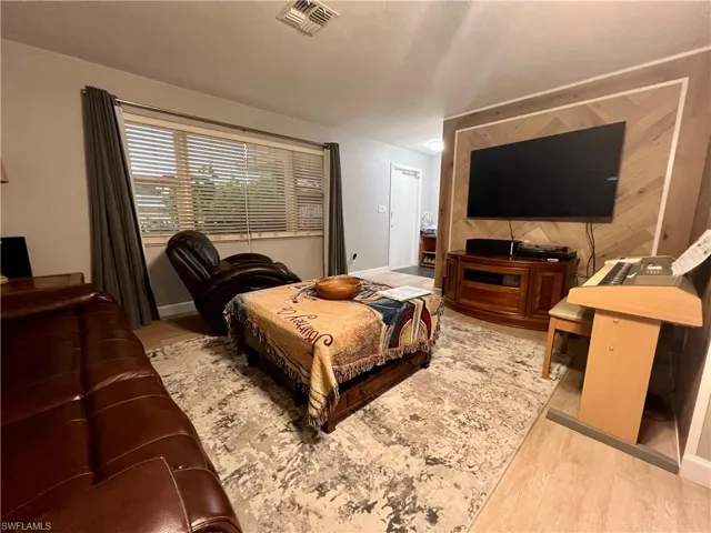 Living room featuring luxury vinyl plank floors