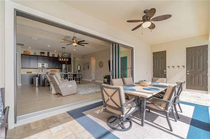 View of patio with ceiling fan