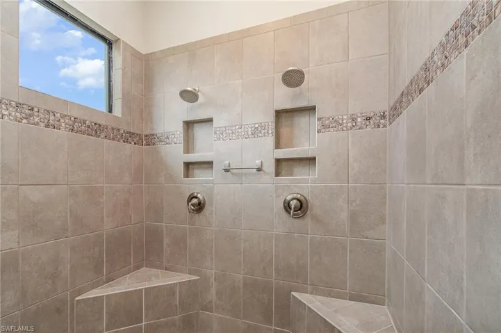 Bathroom with tiled shower