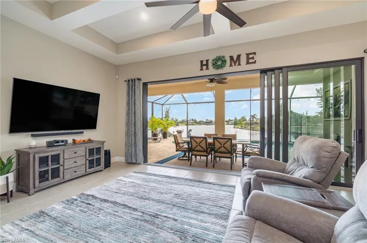 Tiled living room with ceiling fan