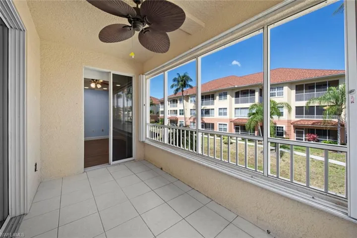 Balcony featuring a ceiling fan
