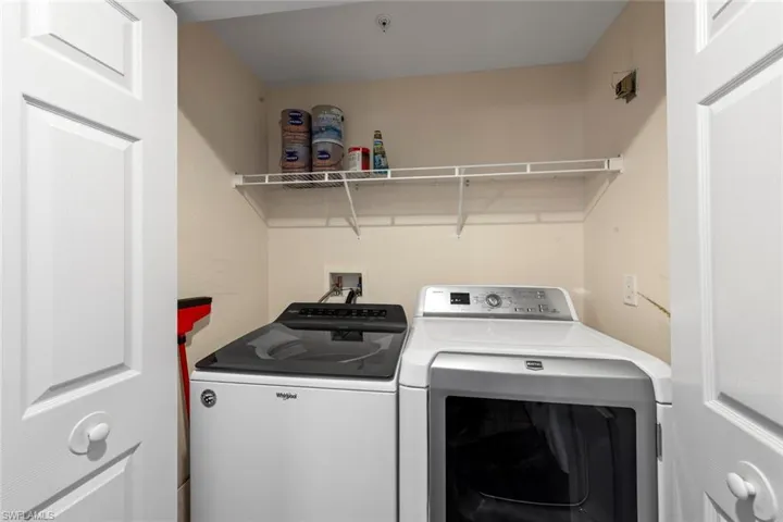 Laundry area with laundry area and separate washer and dryer