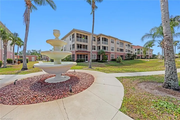 View of property's community featuring a lawn