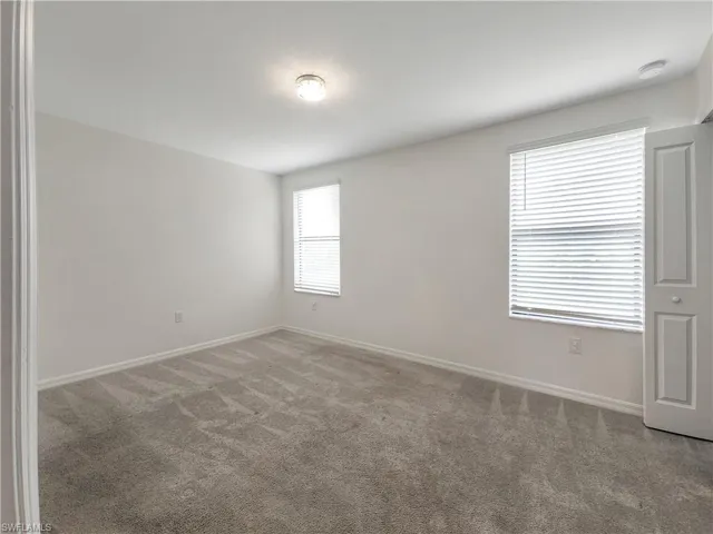 Spare room with carpet flooring