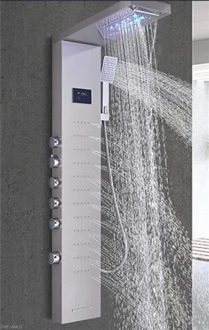 Detailed view of a stall shower and stucco siding