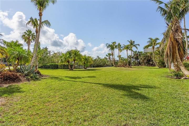 Included lot immediately across the street with protected boat dock and lift