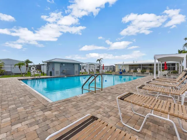 View of swimming pool with a patio