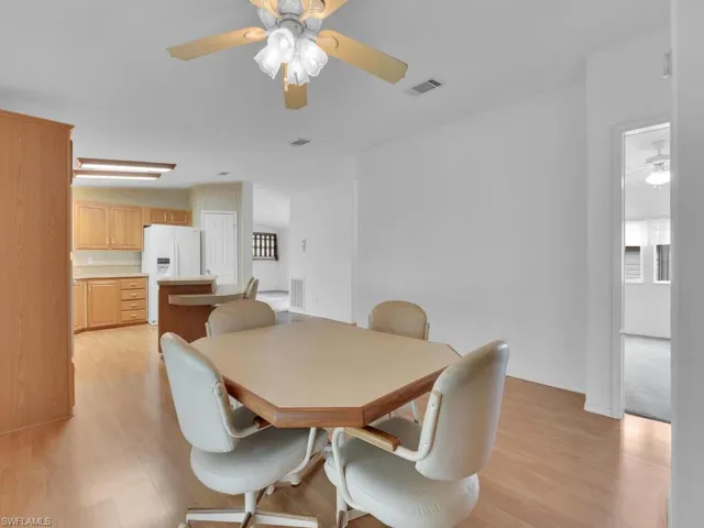 Dining space featuring light hardwood / wood-style flooring