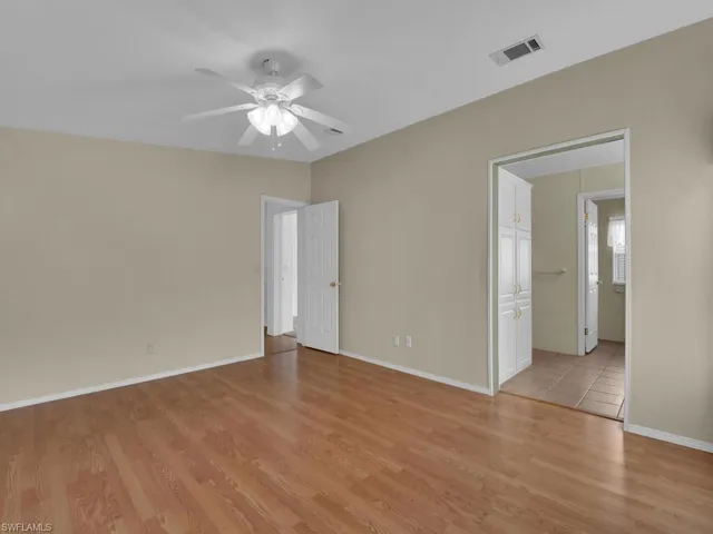 Spare room featuring light hardwood / wood-style flooring and ceiling fan