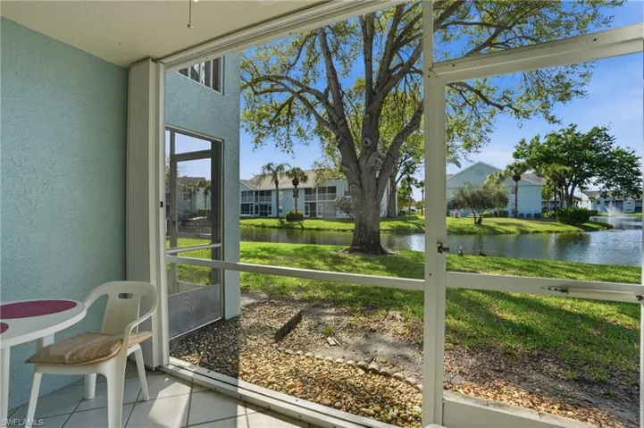 Unfurnished sunroom featuring plenty of natural light and a water view
