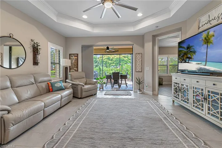 Wow what a stunning family room that leads out to the extended lanai.