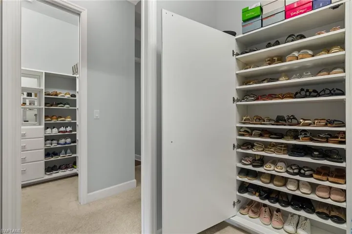 Shoe storage is 1st walk in closet