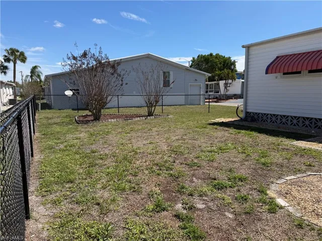 Fenced side and backyard